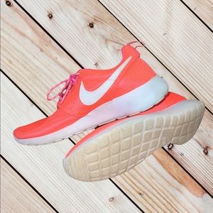 Neon Orange NIKE sneakers